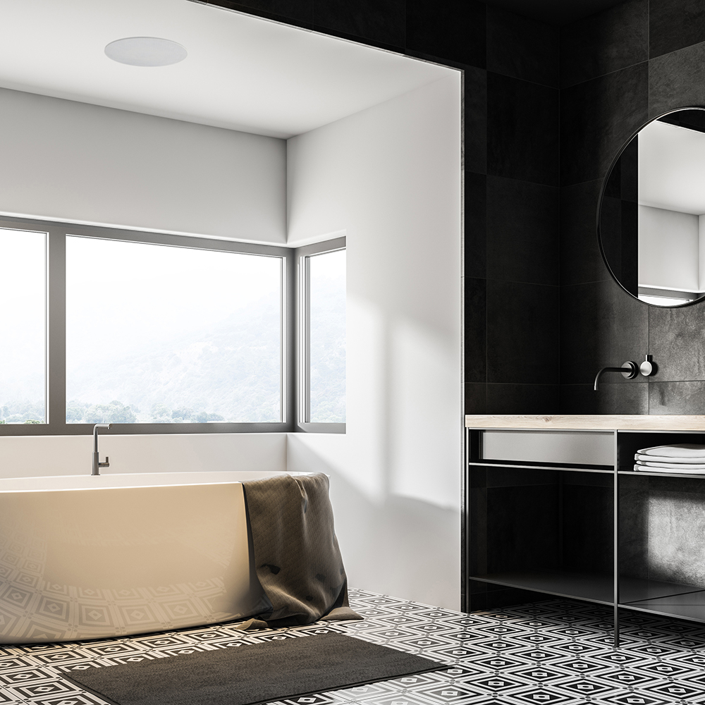 White and black bathroom corner, tub and sink Lithe Audio 6.5 Passive IP44 Ceiling Speaker